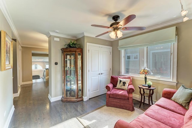221 8th St, Downers Grove, IL 60515 - living area with a baseboard heating unit, wood finished floors, a ceiling fan, baseboards, and ornamental molding