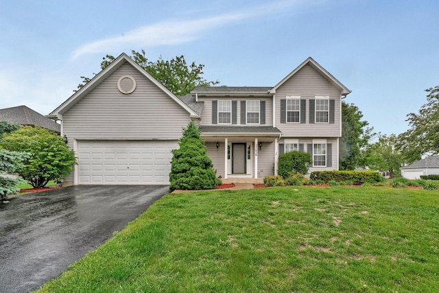 25056 Madison St, Plainfield, IL 60544 - traditional-style home with driveway, a front yard, a garage, and a porch