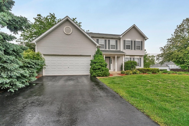 25056 Madison St, Plainfield, IL 60544 - view of front facade featuring asphalt driveway, a front yard, and a garage