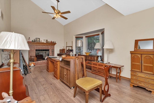 25056 Madison St, Plainfield, IL 60544 - office space featuring light wood-style flooring, high vaulted ceiling, a ceiling fan, a fireplace, and baseboards