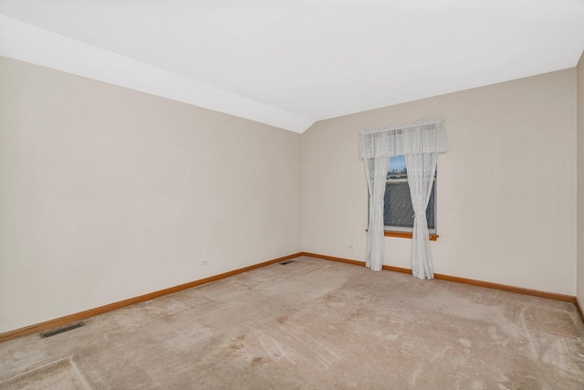 25056 Madison St, Plainfield, IL 60544 - unfurnished room featuring carpet, baseboards, and vaulted ceiling