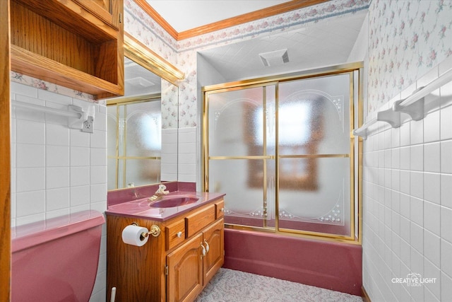 811 W Galena Blvd, Aurora, IL 60506 - bathroom featuring wallpapered walls, vanity, bath / shower combo with glass door, a wainscoted wall, and tile walls