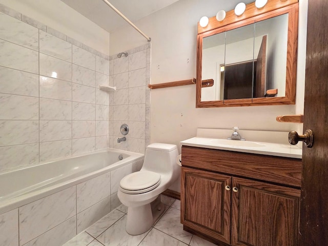 full bath with vanity, toilet, and tiled shower / bath combo