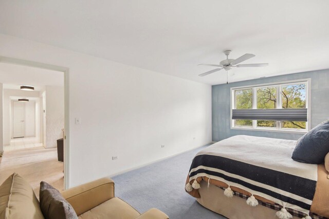 bedroom with carpet floors and a ceiling fan