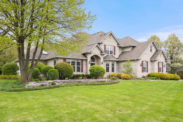 40W434 Triple Oaks Farm Dr, Hampshire, IL 60140 - traditional-style house featuring brick siding, roof with shingles, and a front yard