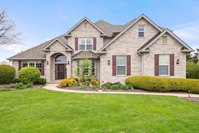 40W434 Triple Oaks Farm Dr, Hampshire, IL 60140 - craftsman inspired home with brick siding, a front yard, and roof with shingles