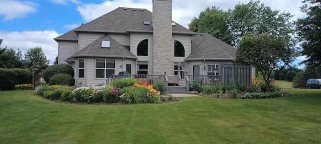 40W434 Triple Oaks Farm Dr, Hampshire, IL 60140 - rear view of house with a yard, a deck, a chimney, and roof with shingles