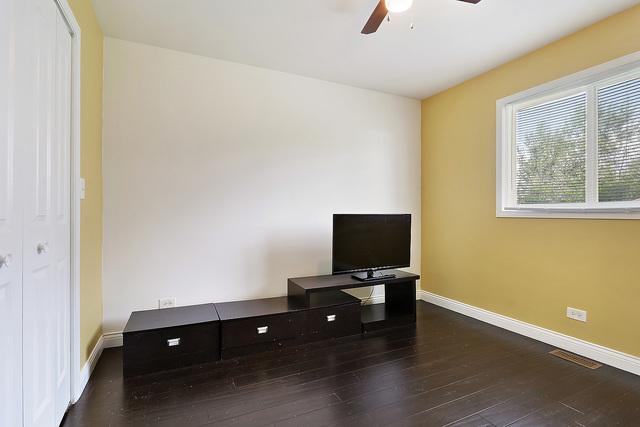 15535 Homan Ave, Markham, IL 60428 - office area featuring ceiling fan and hardwood / wood-style floors