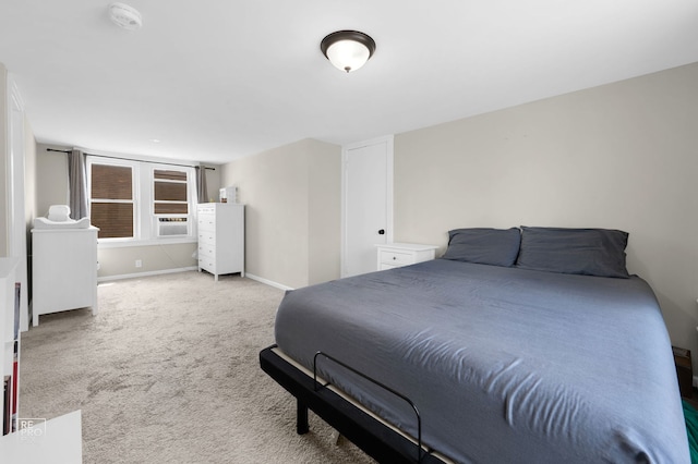 bedroom featuring carpet, baseboards, and cooling unit