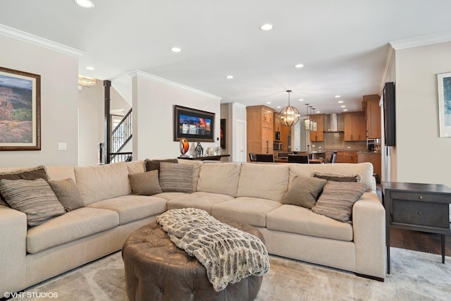 living room featuring recessed lighting, stairs, and crown molding