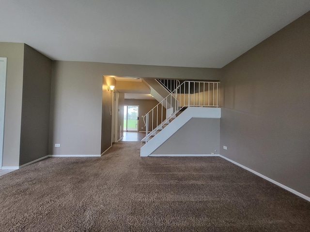 200 Rodenburg Rd, Roselle, IL 60172 - unfurnished living room with stairs, baseboards, and carpet flooring