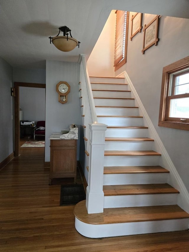24758 S Tryon St, Channahon, IL 60410 - staircase with wood finished floors and baseboards