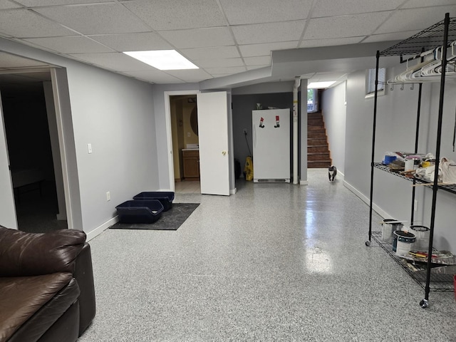 24758 S Tryon St, Channahon, IL 60410 - finished basement featuring freestanding refrigerator, baseboards, a drop ceiling, and stairway