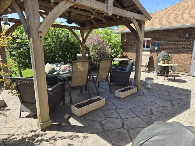 24758 S Tryon St, Channahon, IL 60410 - view of patio / terrace featuring a gazebo, an outdoor hangout area, and outdoor dining area