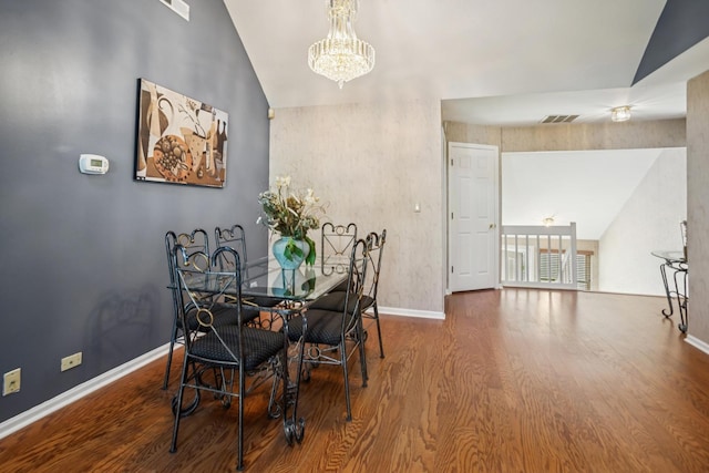 454 Kilkenny Ct Unit 454, Carol Stream, IL 60188 - dining area with wood finished floors, vaulted ceiling, a chandelier, and baseboards