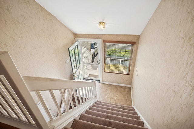 454 Kilkenny Ct Unit 454, Carol Stream, IL 60188 - staircase with baseboards, wallpapered walls, and tile patterned floors