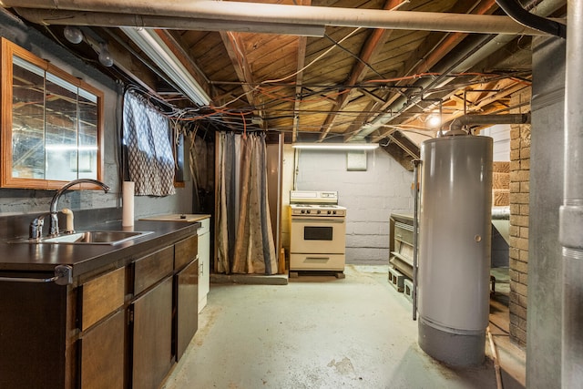 basement with a sink and water heater
