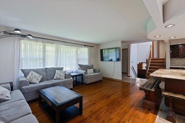 33 Half Day Rd, Lincolnshire, IL 60069 - living room with stairs, dark wood-style flooring, and recessed lighting