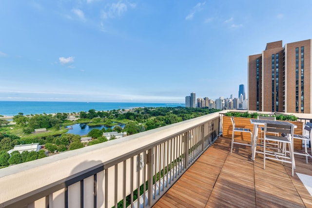 balcony with a city view and a water view