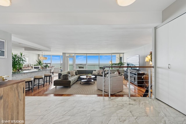 5733 N Sheridan Rd Unit 29D, Chicago, IL 60660 - living area featuring expansive windows and marble finish flooring