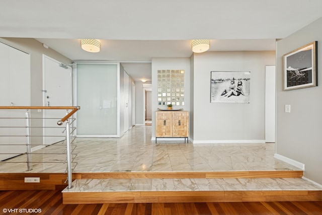 5733 N Sheridan Rd Unit 29D, Chicago, IL 60660 - hallway with marble look tiles and baseboards