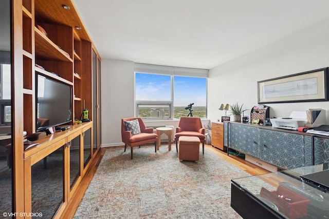 5733 N Sheridan Rd Unit 29D, Chicago, IL 60660 - sitting room featuring wood finished floors and a desk