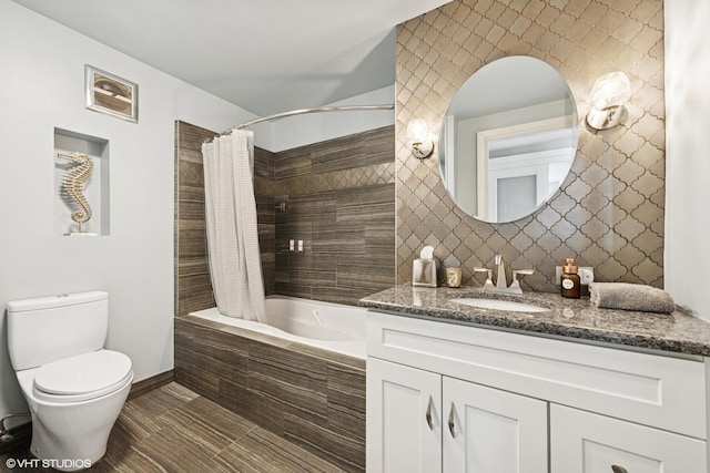 5733 N Sheridan Rd Unit 29D, Chicago, IL 60660 - bathroom featuring tiled shower / bath, vanity, toilet, and baseboards