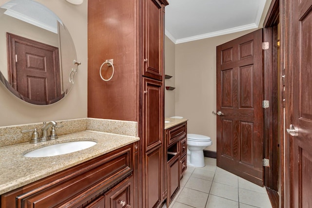 bathroom featuring tile patterned floors, crown molding, toilet, and vanity