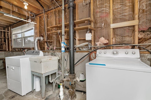 laundry area featuring washer and dryer and laundry area