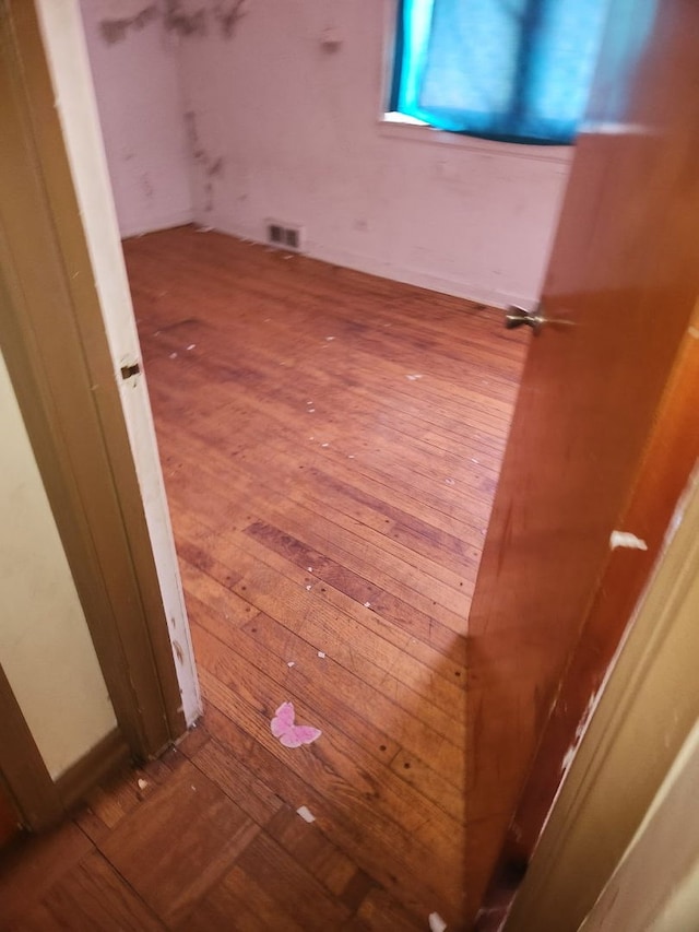 14201 S Wentworth Ave, Riverdale, IL 60827 - interior space featuring visible vents and hardwood / wood-style flooring