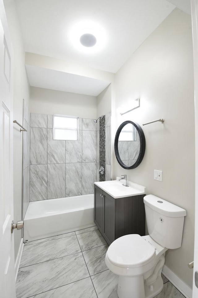 bathroom with shower / bath combination, marble finish floor, baseboards, and toilet