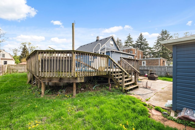 37 Mckinley Ave, Steger, IL 60475 - rear view of property with an outdoor fire pit, a wooden deck, and a patio