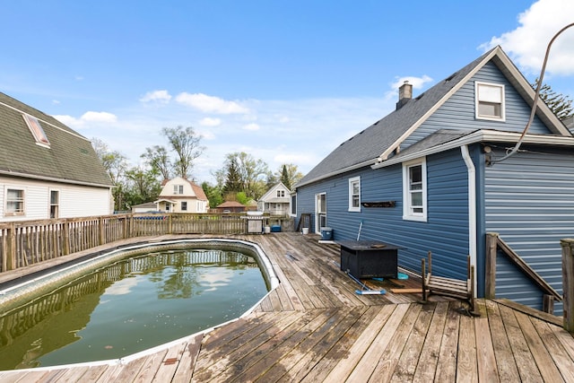 37 Mckinley Ave, Steger, IL 60475 - view of pool with a wooden deck and a fenced backyard