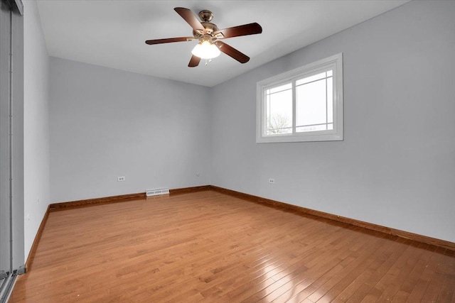 8440 163rd St, Tinley Park, IL 60487 - empty room featuring baseboards, a ceiling fan, and light wood-style flooring
