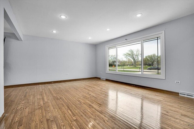 8440 163rd St, Tinley Park, IL 60487 - empty room with recessed lighting, baseboards, and wood finished floors