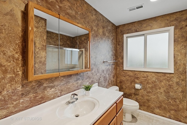 384 Andra Ct, Gilberts, IL 60136 - full bath with visible vents, tile patterned flooring, vanity, toilet, and an enclosed shower