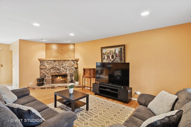 384 Andra Ct, Gilberts, IL 60136 - living room featuring recessed lighting, baseboards, wood finished floors, and a fireplace