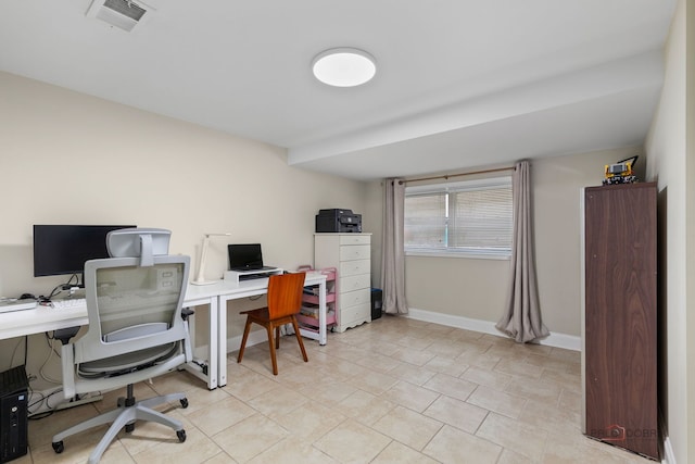 home office with visible vents, baseboards, and light tile patterned floors