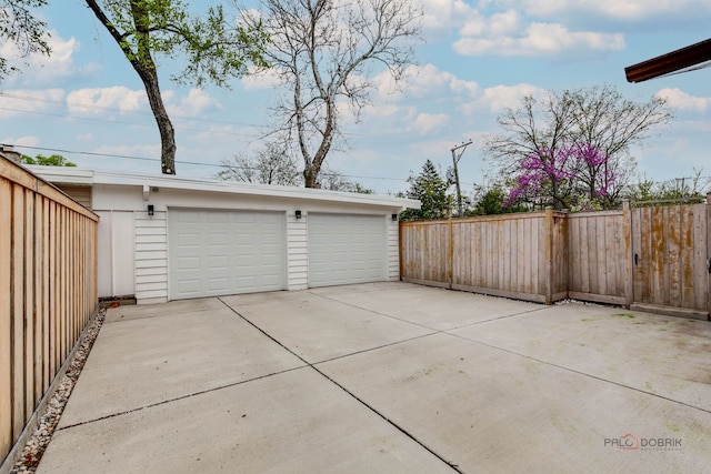 detached garage with fence