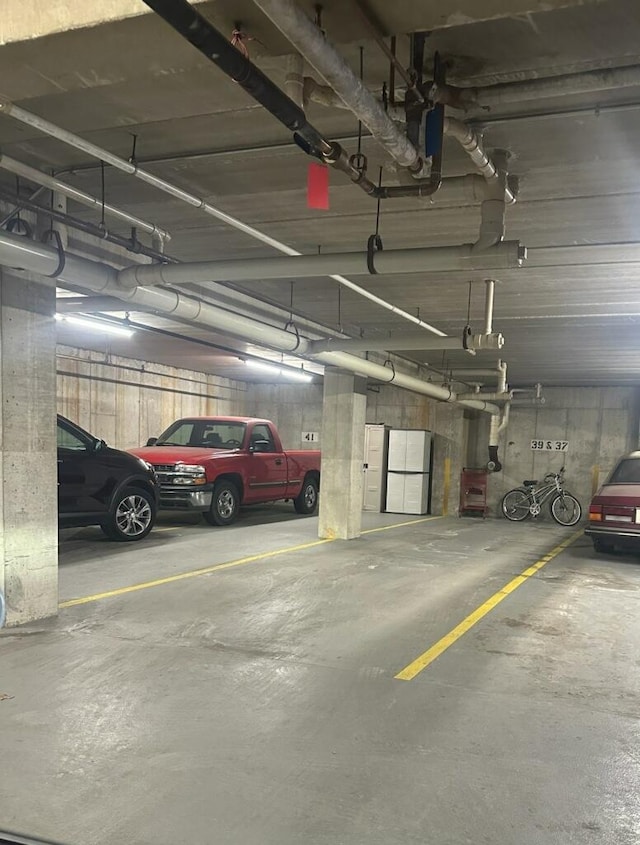 parking garage with freestanding refrigerator