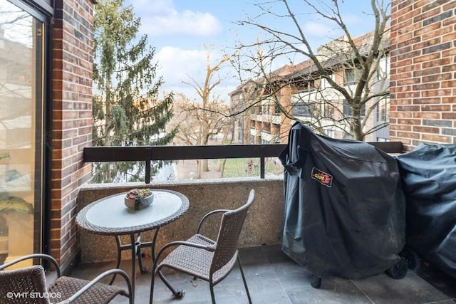 balcony featuring area for grilling