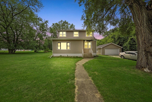 bungalow-style home with a lawn, an outdoor structure, and a detached garage