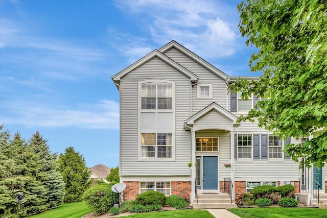 1372 Fox Hound Trl, Beecher, IL 60401 - view of front of home featuring a front lawn and brick siding