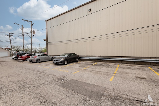 6019 W 64th Pl Unit 7, Chicago, IL 60638 - view of building exterior featuring a residential view, a wall unit AC, and a wall mounted AC