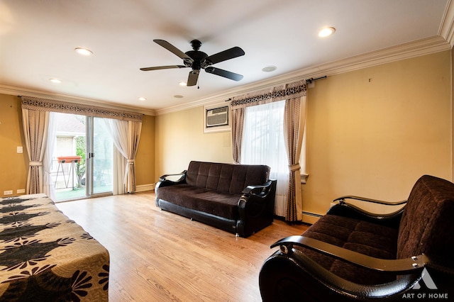 living area featuring crown molding, ceiling fan, light wood-style floors, and a baseboard heating unit