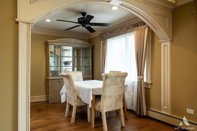 dining area featuring ceiling fan, baseboard heating, recessed lighting, dark wood-type flooring, and ornamental molding
