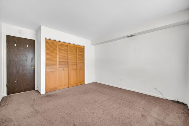 3010 Bernice Rd Unit 104, Lansing, IL 60438 - unfurnished bedroom featuring carpet floors and a closet