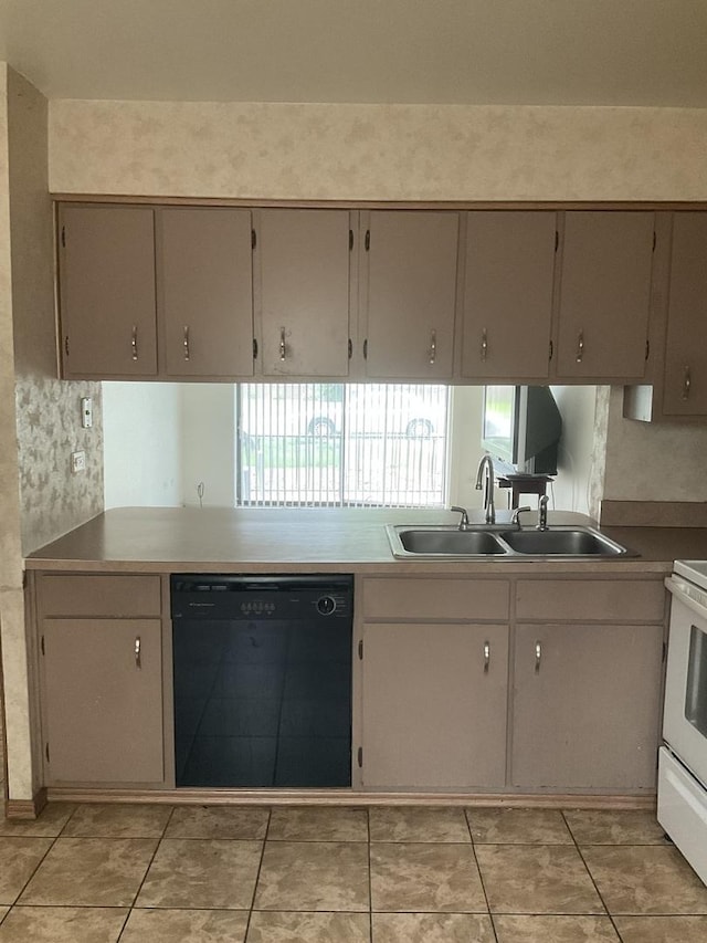 3010 Bernice Rd Unit 104, Lansing, IL 60438 - kitchen with black dishwasher, a sink, and white range oven