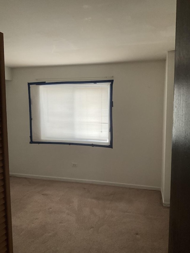 3010 Bernice Rd Unit 104, Lansing, IL 60438 - carpeted empty room featuring plenty of natural light and baseboards