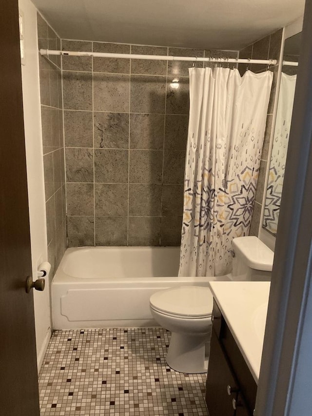 3010 Bernice Rd Unit 104, Lansing, IL 60438 - full bathroom with vanity, toilet, shower / bath combo with shower curtain, and tile patterned flooring